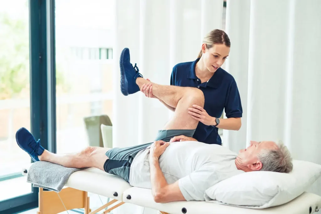 Revitalising Recovery: Effective Rehabilitation Strategies for Muscle Injuries 3 Physiotherapist assisting a patient with muscle recovery exercises Leigh-on-Sea