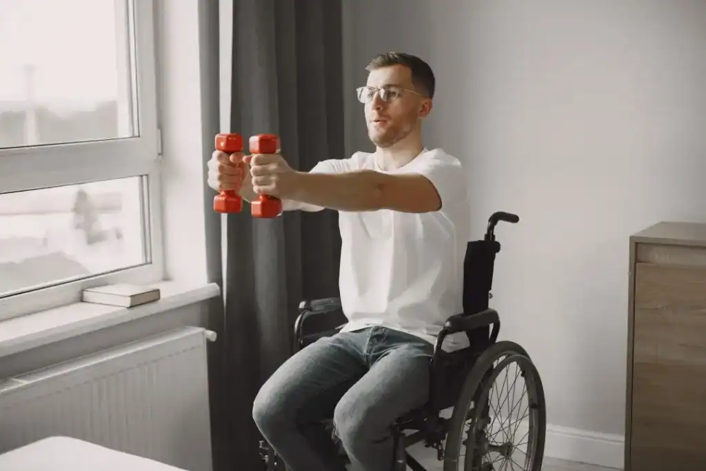 Image of man doing exercise in his wheelchair to aid weight loss Leigh-on-Sea